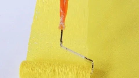 The roller is painted yellow on the floor. Video stock 94265851