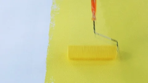 The roller is painted yellow on the floor. Video stock 94265902