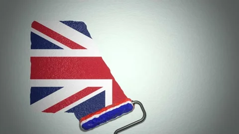 Roller paints the wall with paint in colors of United Kingdom flag. Travel conce Stock Footage 168486953