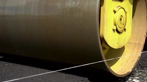 Roller paving asphalt close up of a wheel  Video stock 270519407