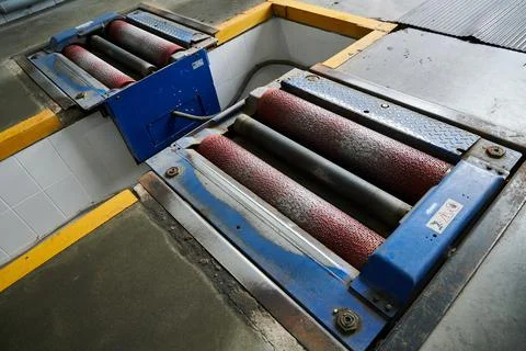 Roller power unit for an in-depth test of the vehicle's braking system at a Stock Photos