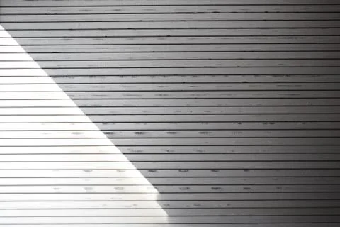 A roller shutter with nice cast shadows 写真素材