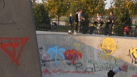 Roller Skater Doing a Trick in Concrete Skate Park Slow Motion Video stock 121007934