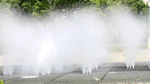 Roller-Skater Falling from Bench Behind Water Fountain Stock Footage 753451