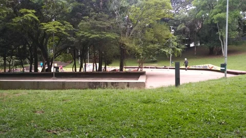 Roller skater learning jump manover park  Stock Footage 168933088