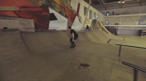 Roller skater rolls on edge springboard ... | Stock Video | Pond5