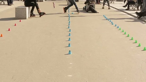 Roller skaters (roller blader) practice in the streets near Notre Dame de Paris Stock Footage 133766927