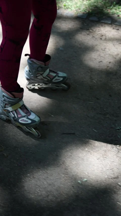 Roller skates struggle across dirt where no smooth paved path is available Video stock 341476363