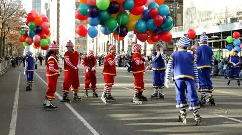 Roller skating clowns in Macy's parade Stock Footage 10560777