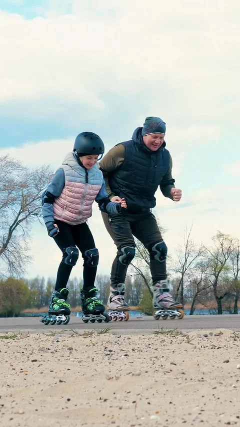 Roller skating outdoors. rollerblading outdoors. teenage girl is learning roller Stock Footage 316777674