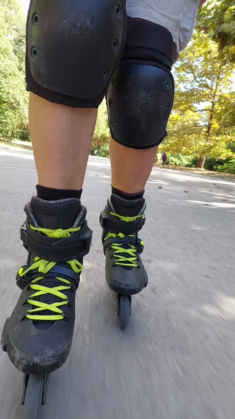Roller skating pov asphalt park 4k vertical raw sound Stock Footage 345418725