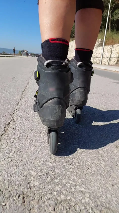 Roller skating pov asphalt seaside 4k vertical 008 2 Stock Footage 344883959