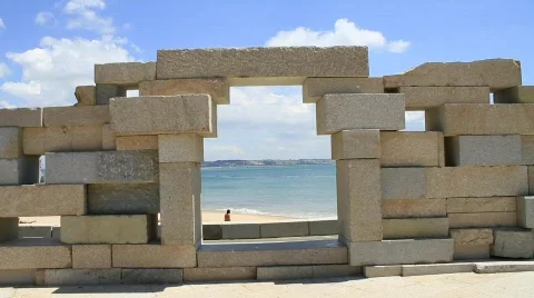 Roller-Skating By The Sea Framed In A Stone Window 스톡 동영상 765529