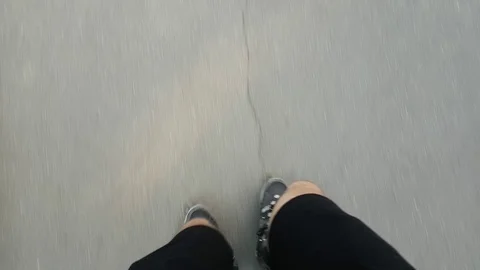 Roller skating on a street Vídeos de archivo 77070650
