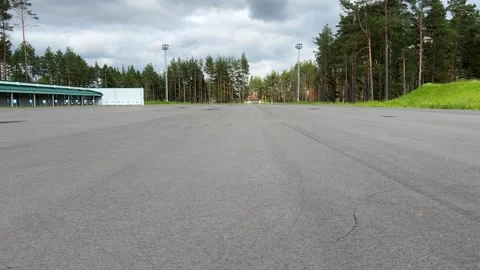 Roller skating training on a wide asphalt sports ground Vidéo 336796591