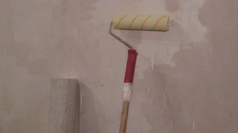 Roller Stick gluing wallpaper rolls vinyl preparing the surface walls apartment Stock-Footage 148396972