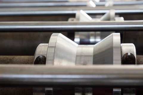 Roller of tile forming machine Stock Photos