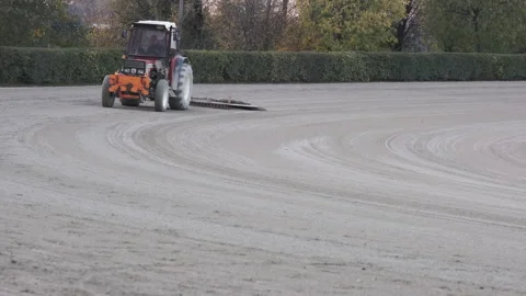 Roller Tractor prepares the arena field for an Equestrian competition in Italy 動画素材 164984104