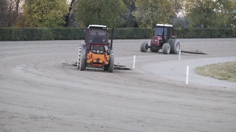 Roller Tractor prepares the arena field for an Equestrian competition in Italy 動画素材 164985700