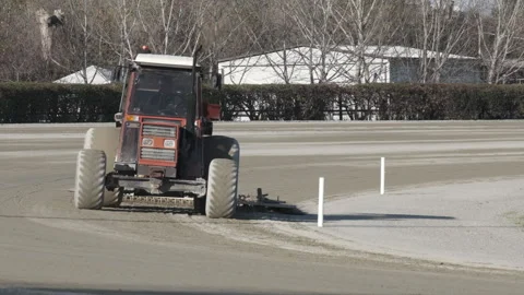 Roller Tractor prepares the arena field for an Equestrian competition in Italy Stock Footage 166164857