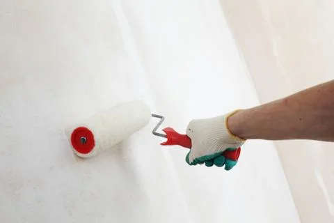 Roller on the wall Stock Photos