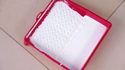 Roller with white paint Stock Footage 75038178