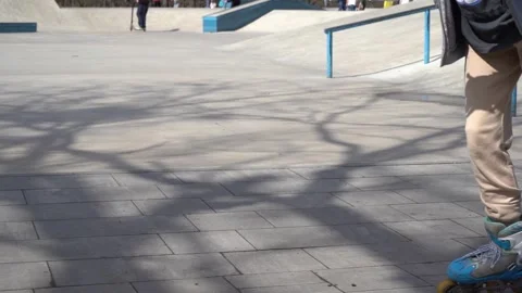 Rollerblading. Making a U-turn close-up slow motion Stock Footage 329180669