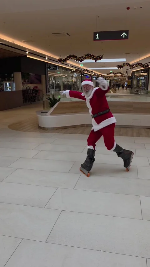 Rollerblading Santa Has Fun In Shopping Mall, Ljubljana, Slovenia - 10 Dec 2025 Stock Footage 323454721