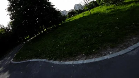 Rollerblading Through a Beautiful Park Stock Footage 280494392