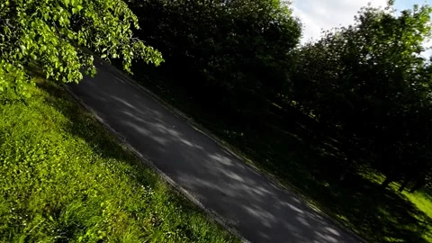 Rollerblading Through a Beautiful Park Stock Footage 280589950