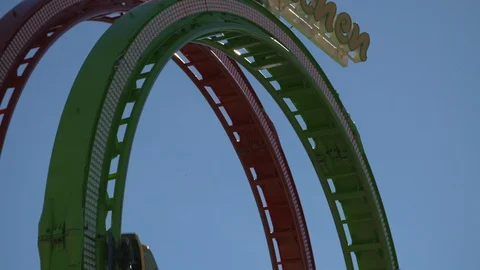 Rollercoaster with looping at the Oktoberfest Stock Footage 118901324
