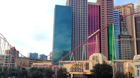 Rollercoaster outside the New York-New York Hotel and Casino on the Strip Stock Footage 237427533