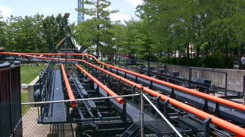 Rollercoaster pulling into Station 스톡 동영상 471429