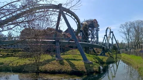 RollerCoaster Ride Drop with Looping in a Sunny Day Stock Footage 239039373