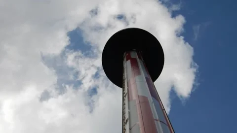 Rollercoaster Ride Drops From High Point on Cloudy Day Video stock 332381573