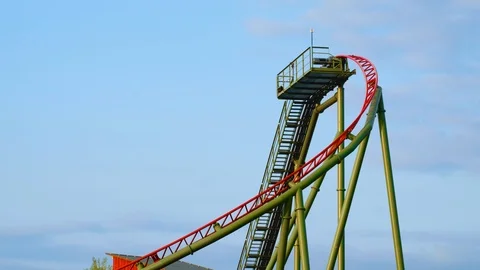 Rollercoaster tracks with empty cart rolling through 스톡 동영상 94798376