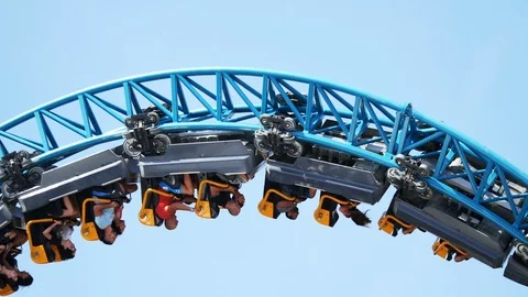 Rollercoaster upside down closeup against clear sky Stock Footage 95054626