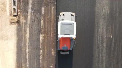 Rollers compact  is driving over freshly poured asphalt, Stock-Footage 146841758