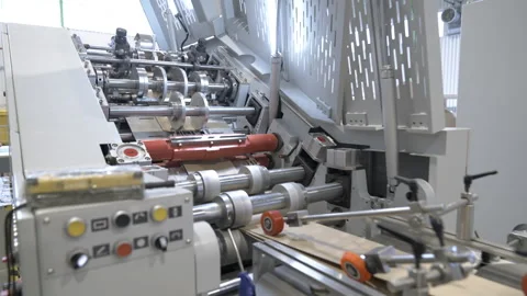 Rollers for tensioning paper web in large plant workshop Stock-Footage 296576921