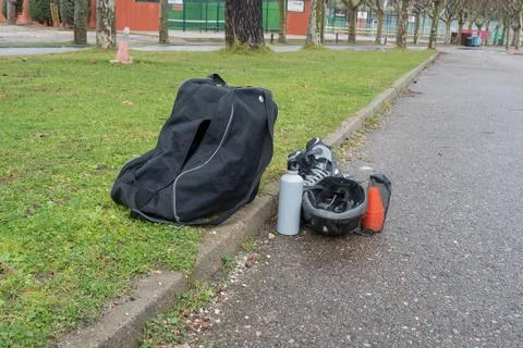 Rollerskating equipment on the grass. No people Stock Photos