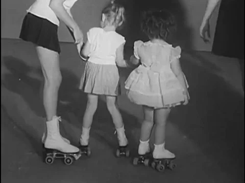 Rollerskating lessons, coaching, Major League Baseball player Gilbert James Stock Footage 79458678