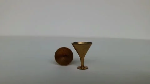 Rolling ancient drinking utensil of brass Stock Footage 155542452