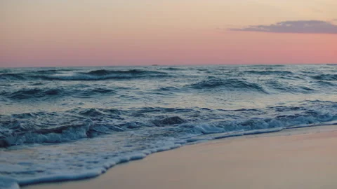Rolling and splashing sea waves on sand Stock Footage 155907950