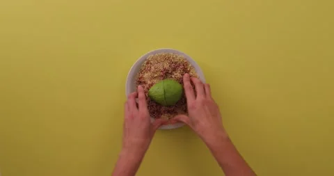 Rolling avocado in bacon and breading mixture 1 Vídeo Stock 132136550