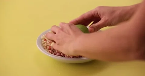 Rolling avocado in bacon and breading mixture 3 Video stock 132136611