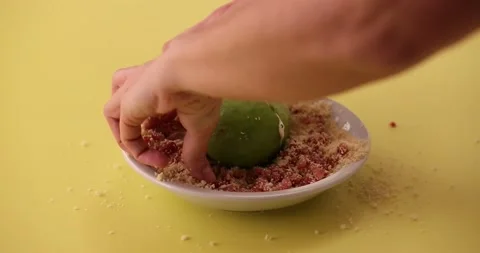 Rolling avocado in bacon and breading mixture 4 Vídeo Stock 132136653