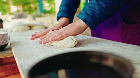 Rolling Bread Dough Beside A Traditional Clay Oven Stock Footage 346256386