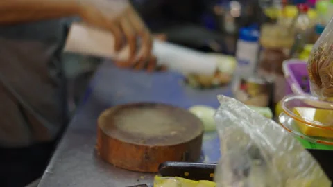 Rolling a burrito, delivering to the client and getting paid Stock Footage 234979925