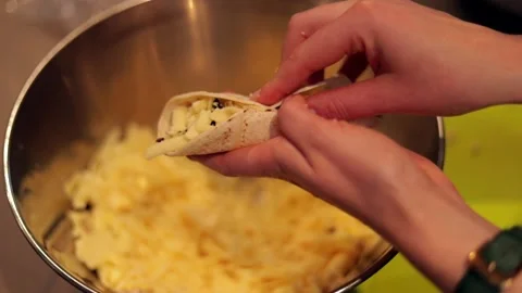 Rolling up burrito in slow motion Stock Footage 149118712
