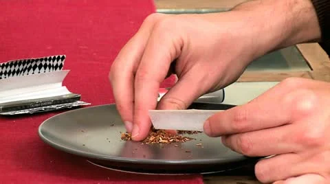 Rolling Cigarette 1 Stock Footage 10907421
